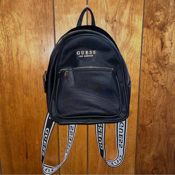Guess Handbags - GUESS Black Backpack with Logo Straps
